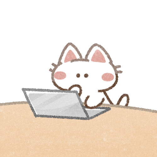 パソコンをする猫