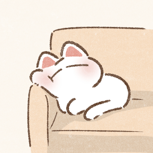 ソファでのんびりする猫さんのフリーアイコン