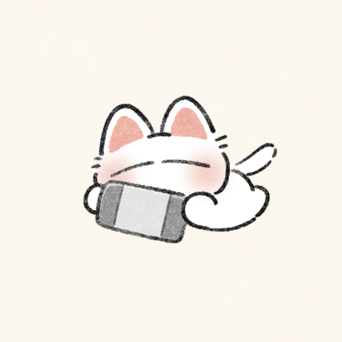 ゲームを楽しむ猫さんのフリーアイコン